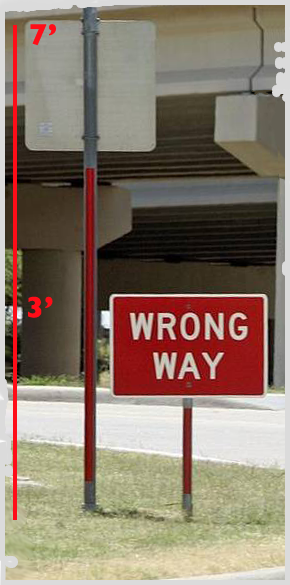 Pictured: Traffic signs at both standard and reduced heights.